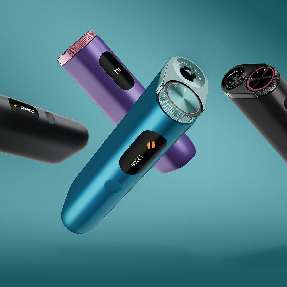 Four sleek, modern electronic vaporizers in blue, purple, and black colors float against a teal background, each featuring digital displays and buttons with different labels and settings.