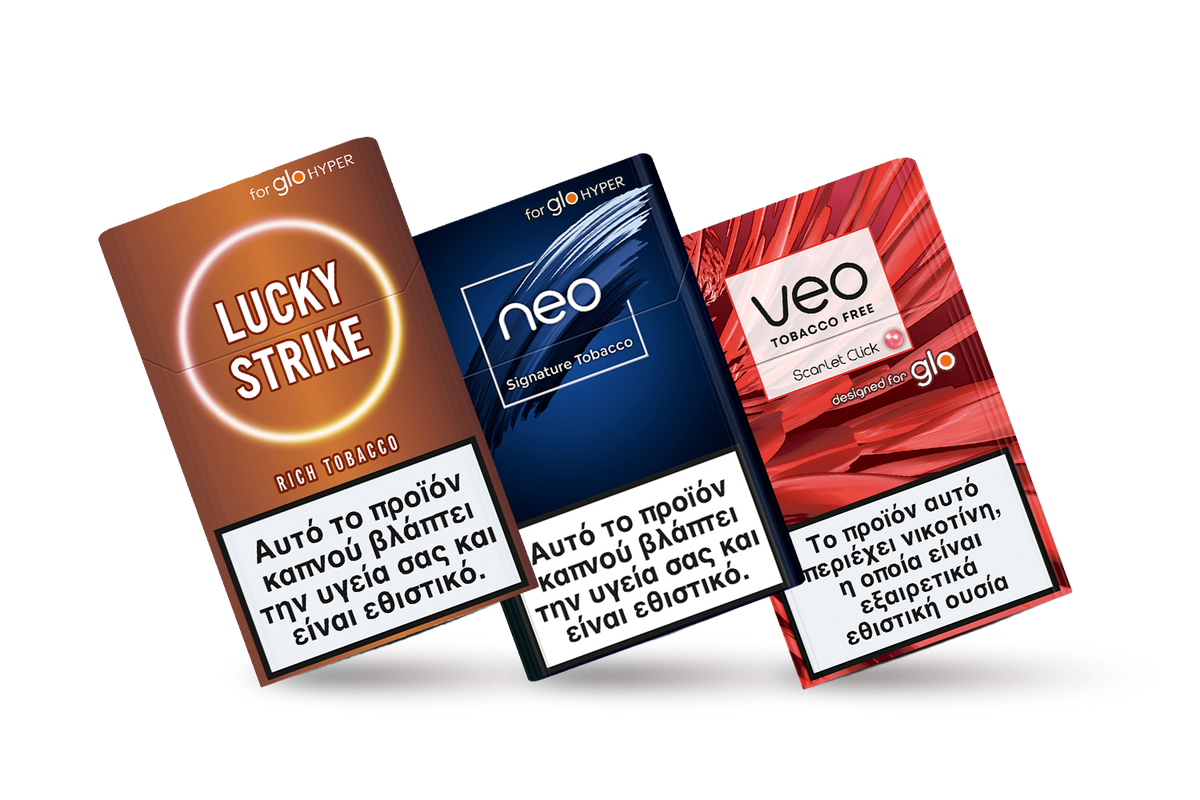 Three cigarette and tobacco product packs labeled Lucky Strike, Neo, and Veo with Greek health warnings; the packs feature brown, blue, and red designs on a white background.